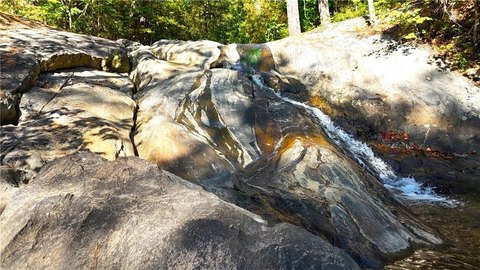 49 Acres with Private Waterfall