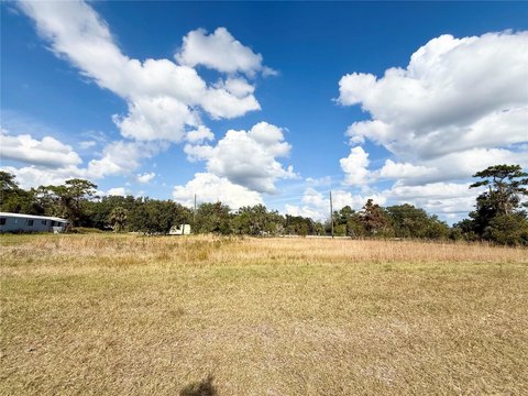 Zoned Acreage with Pond
