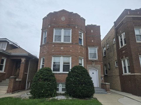 Brick Triplex with Garage