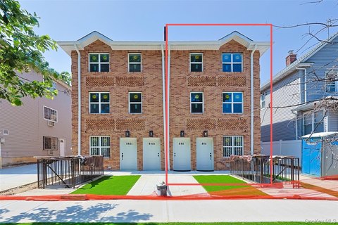 Newly Built Three-Family Brick Home