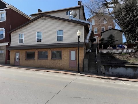 Mixed-Use Building with Vacant Storefront