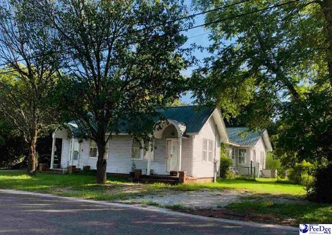 Duplex with Detached Carport