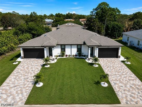 Contemporary Duplex with Garages