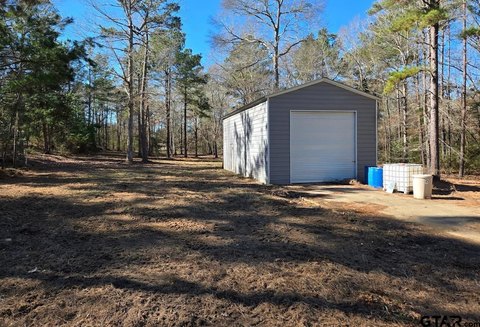 Creek-Running Acreage with Outbuildings