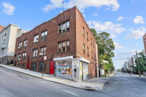 Renovated Multifamily Property with Land