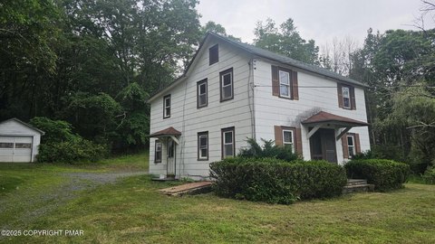 Farmhouse on 9+ Acres