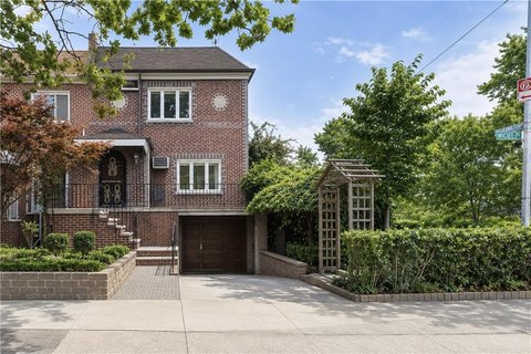 Brick Triplex With Yard