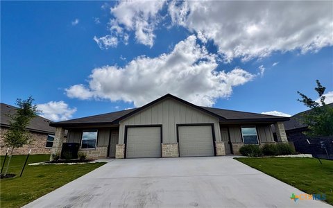 Duplex with Private Fenced Backyards