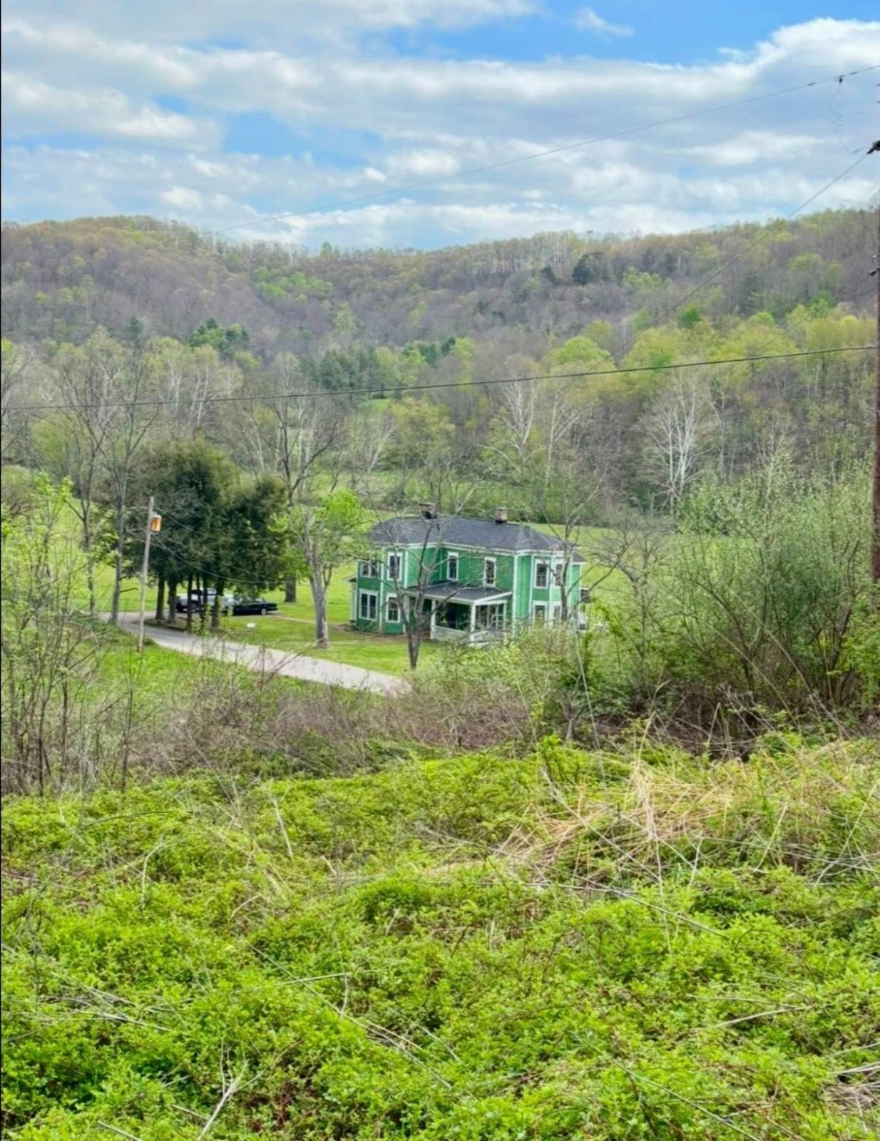 Turn-of-the-Century Farmhouse on 211 Acres