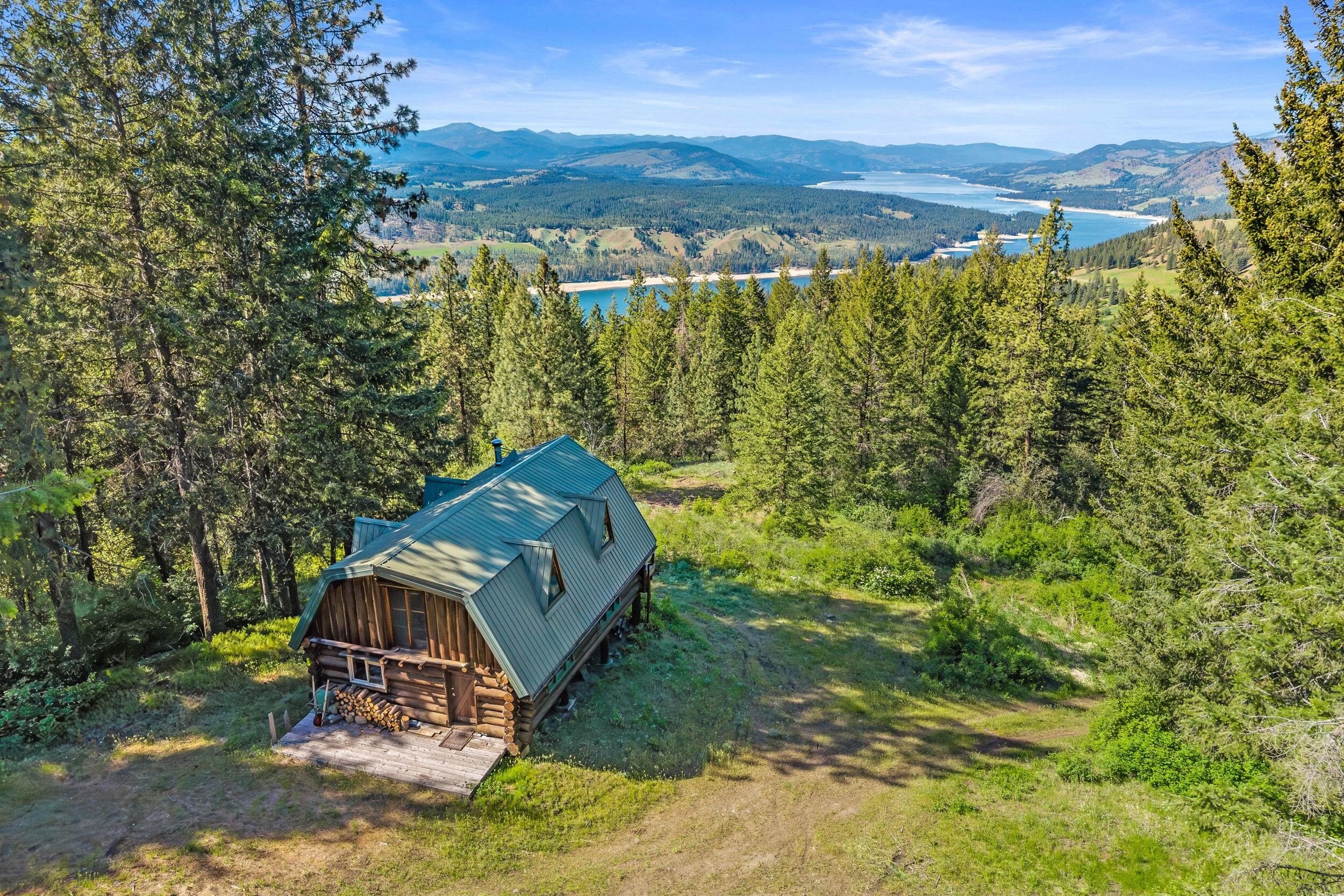 Secluded Land with Log Cabin