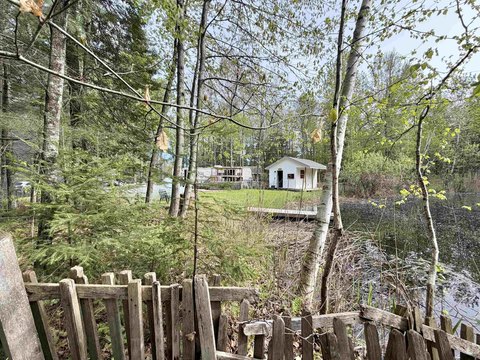 Land with Camper and Pond
