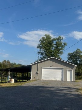 Unrestricted Land with Metal Building