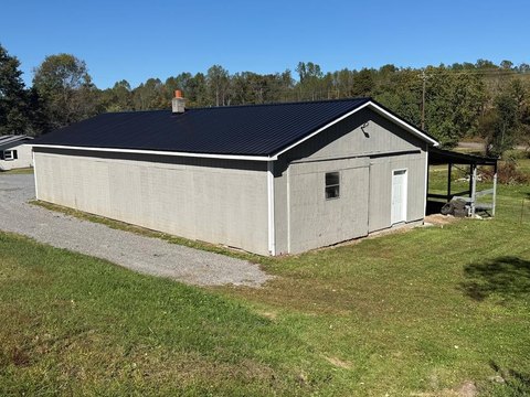Unrestricted Land with Metal Building