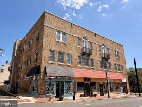Mixed-Use Building with Four Retail Units