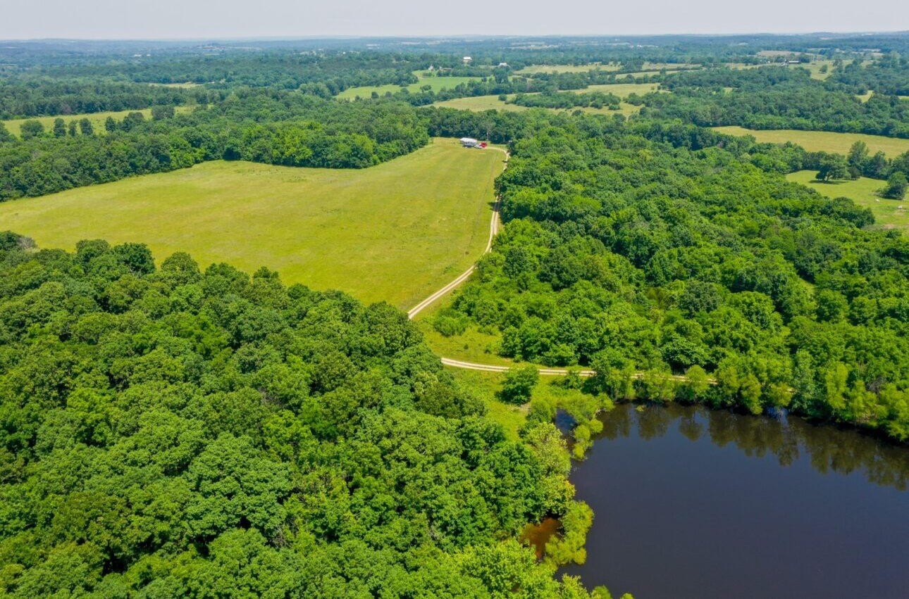 Secluded Land with Pond and Creek