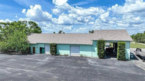 Concrete Auto Shop with RV Doors
