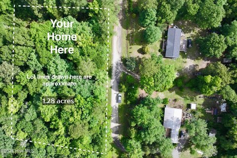 Leland Wooded Lot with Utilities