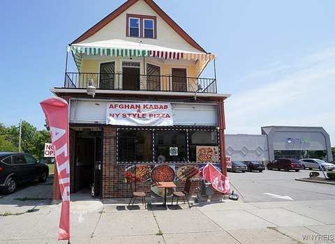Restaurant and Renovated Apartment Building