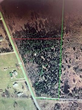 Deed-Restricted Wooded Acreage with Dual Frontage