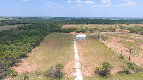 Partially Cleared Acreage with Shop