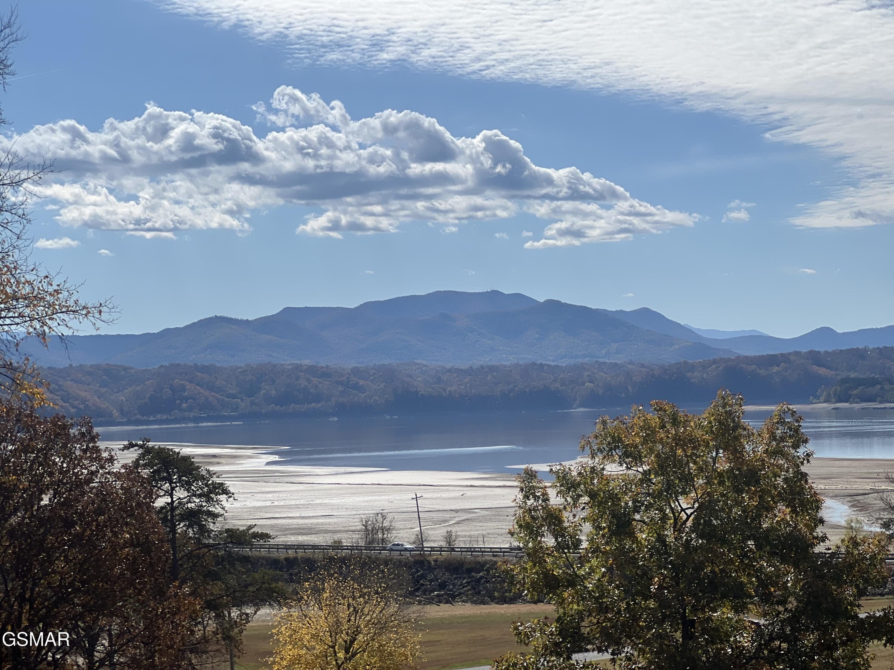 Land with Mountain and Lake Views