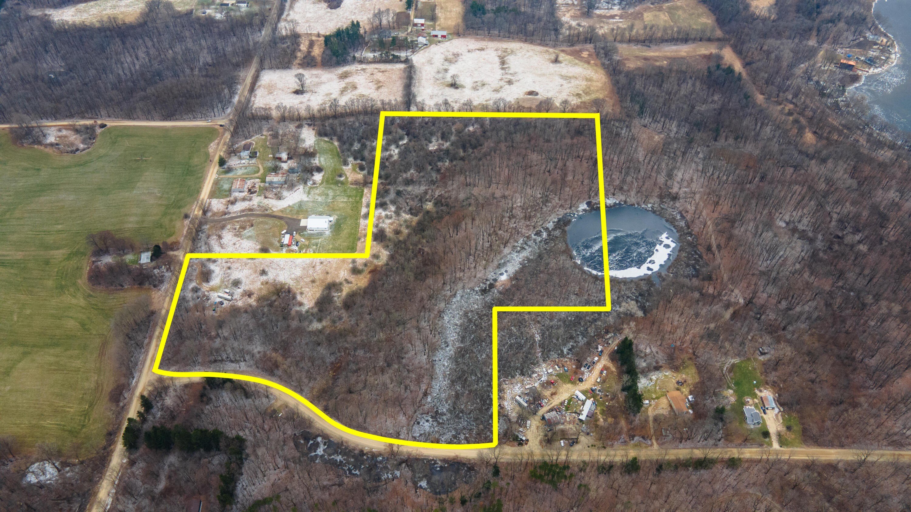 Beautiful Wooded Acreage with Lake