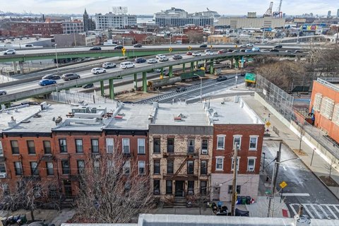 Brooklyn Multifamily Residence with Backyard
