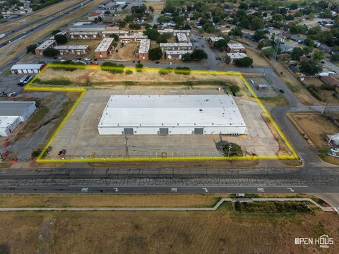 Fenced Warehouse with Grade-Level Doors