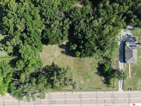 Highway Frontage Lot with Trees