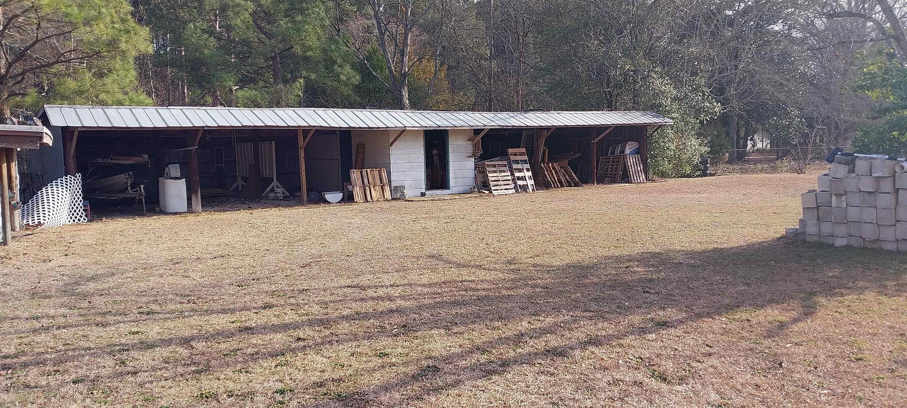 Seven Bay Garage on Land