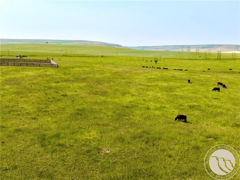 Fenced Ranch With Farmhouse