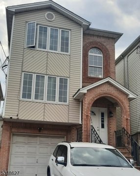 Two-Family Duplex with Solar Panels