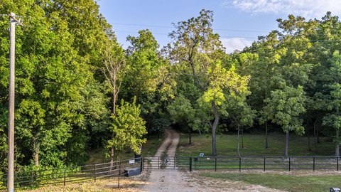 Wooded Hunting Land with Residences