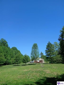 Wooded Recreation Land with Buildings
