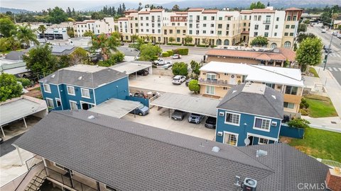 Three-Unit Triplex with Carports