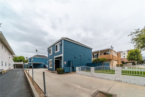 Three-Unit Triplex with Carport Parking
