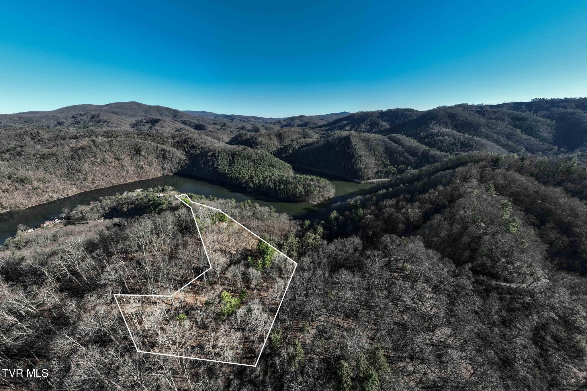 Land with Mountain and Lake Views