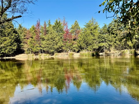 Wooded Farmland with Pond and Water