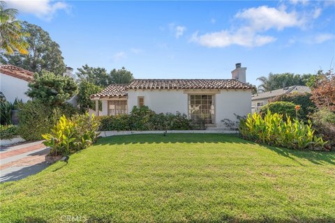 Spanish-Style Duplex with Private Yards