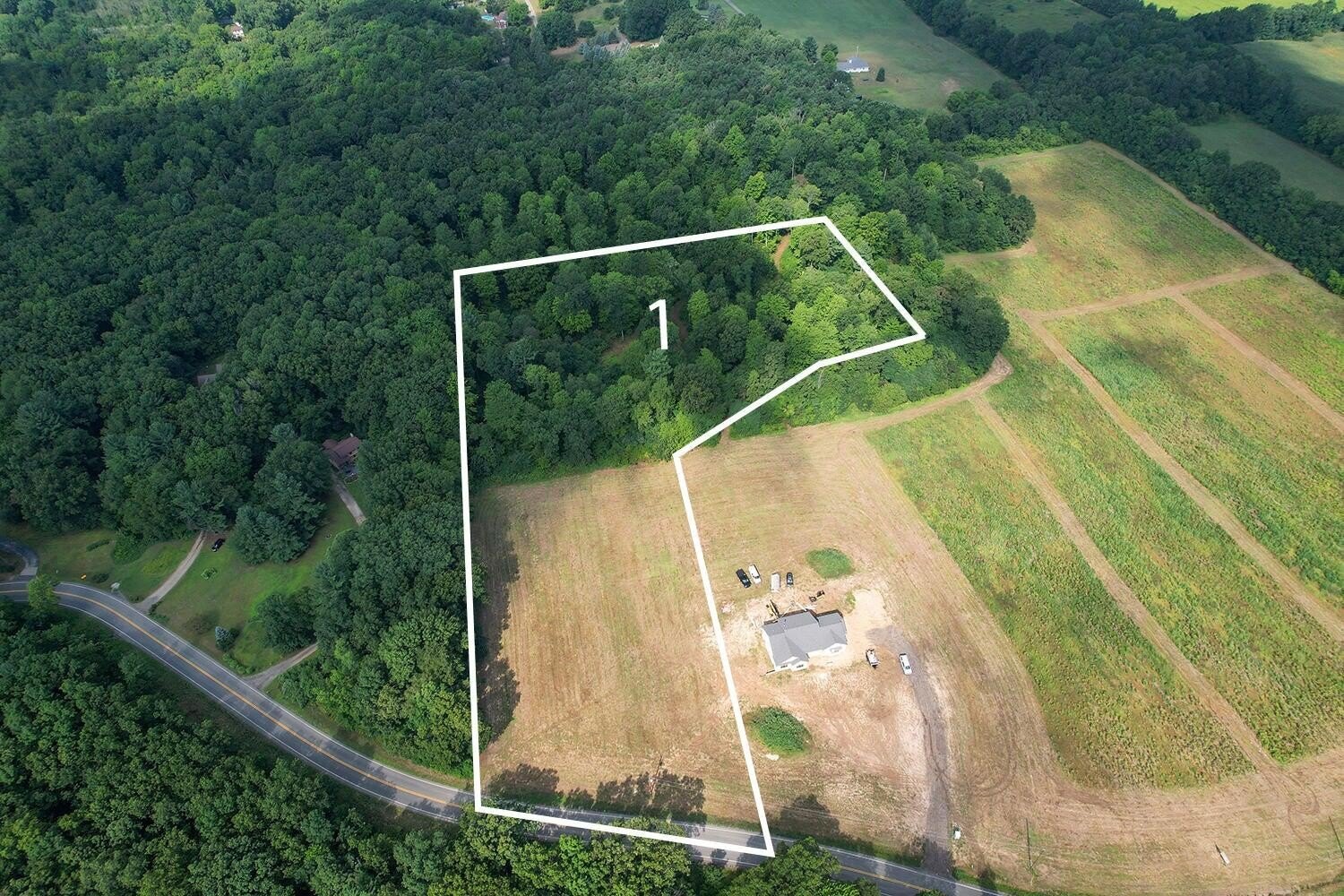 Wooded Acreage with Building Sites