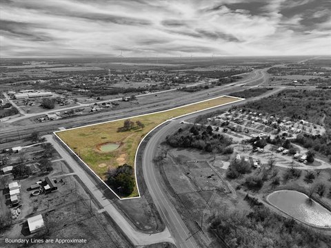 Versatile Acreage with Dual Road Access