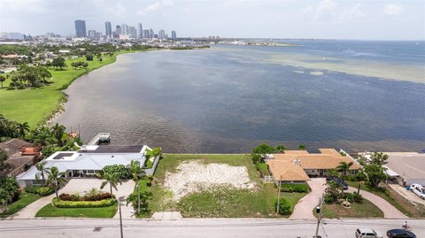 Waterfront Land with Skyline Views