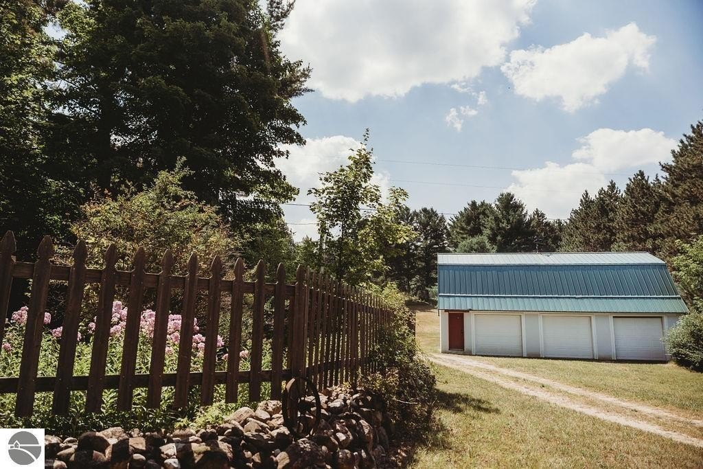 Wooded Land Parcel with Garage