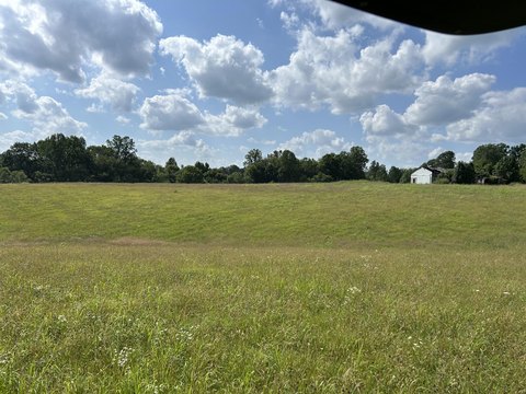 Fenced Agricultural Acreage with Barn