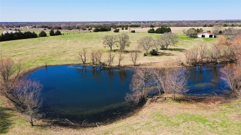 Ranchland with Pond and Barns