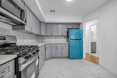 Renovated Three-Family Brick Property