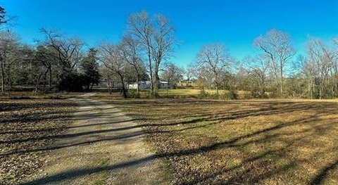 Acreage with Shop and Wooded Areas