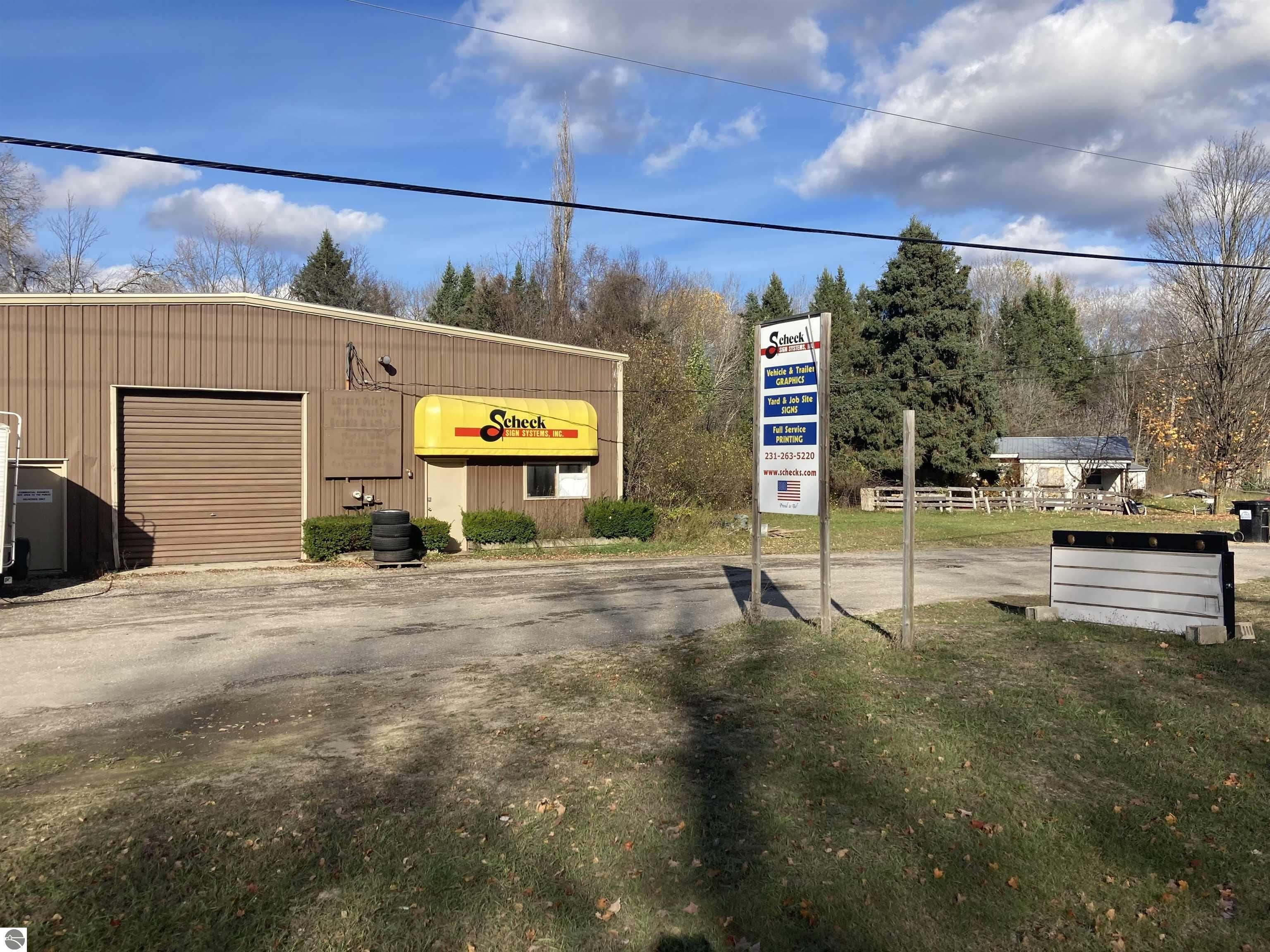 Kingsley Shop Building with Rental Income