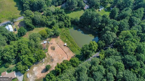 Pastured Land with Spring Fed Lake