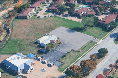 Improved Commercial Land with Existing Building